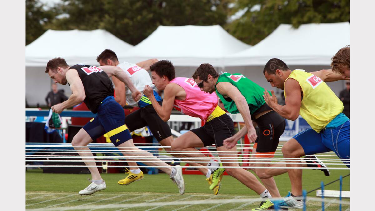 John Adams in the green moves out of the blocks in his heat of the Australia Post Stawell Gift.