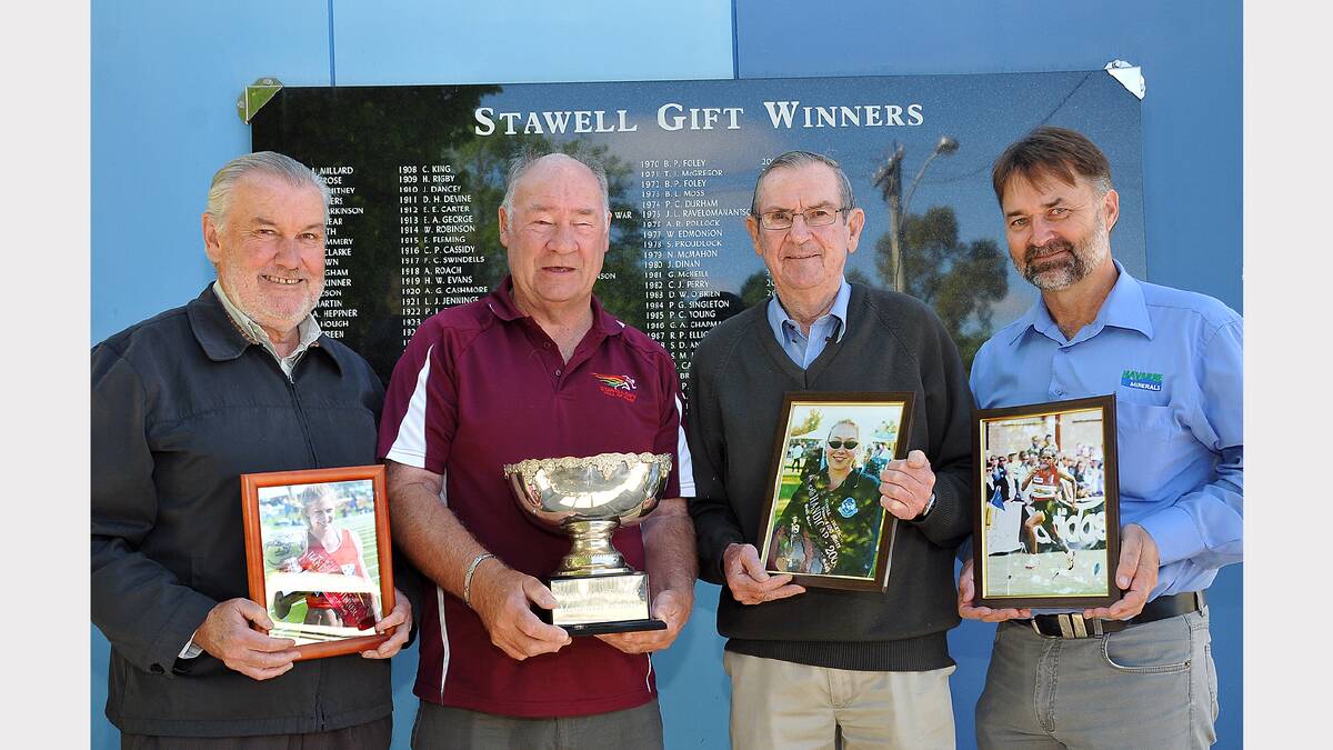 Pictured holding the Women's Gift trophy and photos of past winners L-R Robert Irvine, Trevor Skurrie, Murray MacPherson and Geoff McDermott.