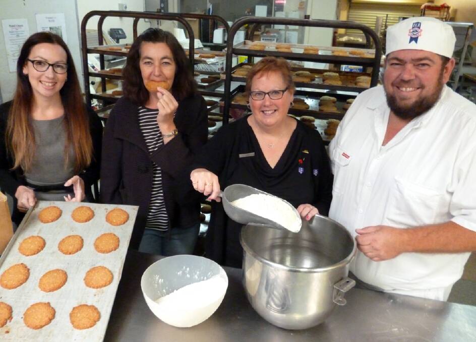 Jessica Cass, Julie Cass and Janet Enright from the Stawell Branch of the Country Women's Association are pictured with Chris Waack from Waack's Bakery.