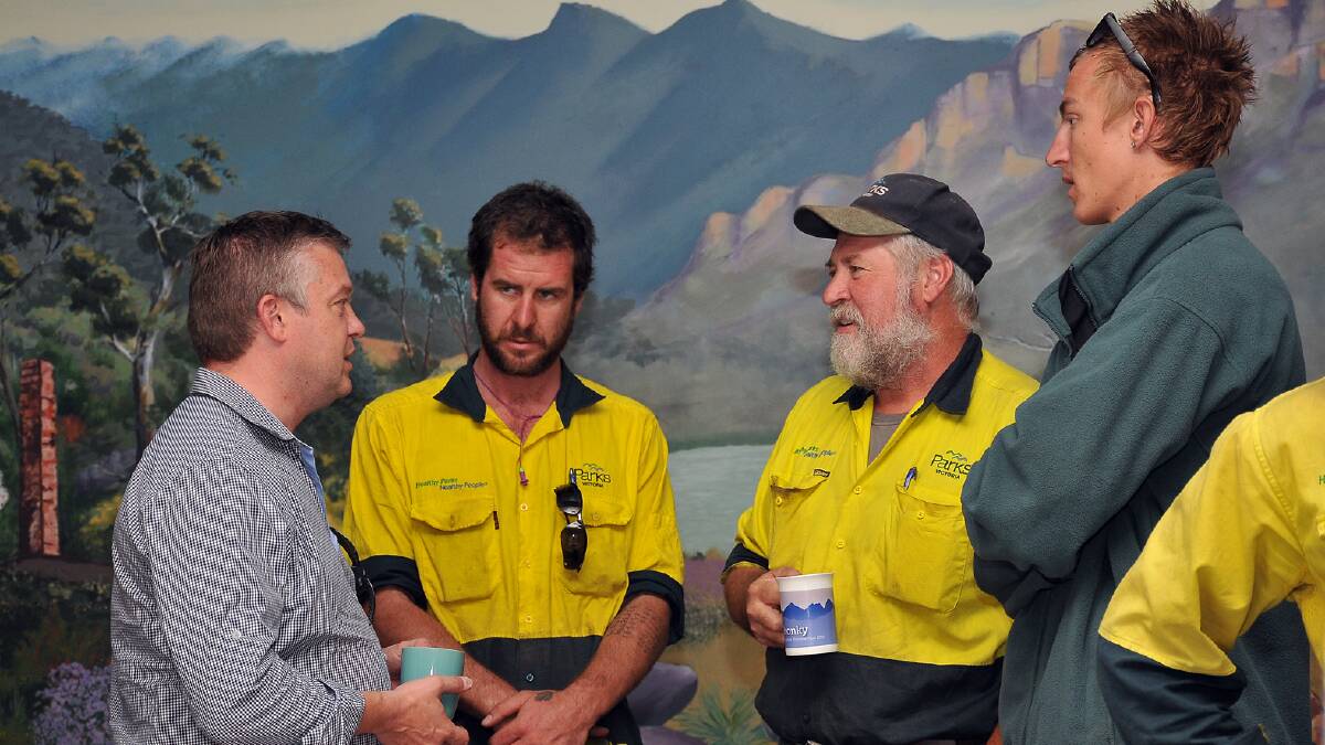 Minister for Environment and Climate Change, Ryan Smith (left), is pictured speaking with Tom Campbell, Graeme Scherger and Mitchell Olafsen during his visit to Halls Gap and the Grampians last week. Picture: KERRI KINGSTON.