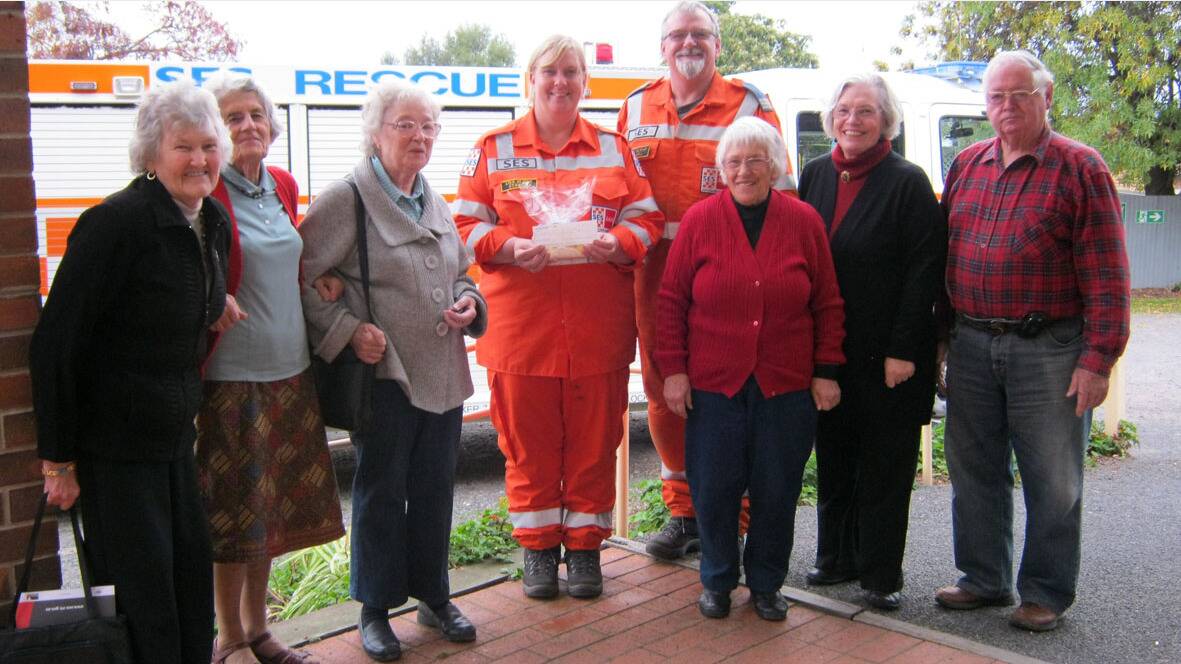 Pictured with State Emergency Service volunteers Lisa and Alan Blight, are Fellowship members L-R Shirley Joiner, Elva Raggatt, Betty Reid, Joyce Matheson, Jean and Bill Byron.