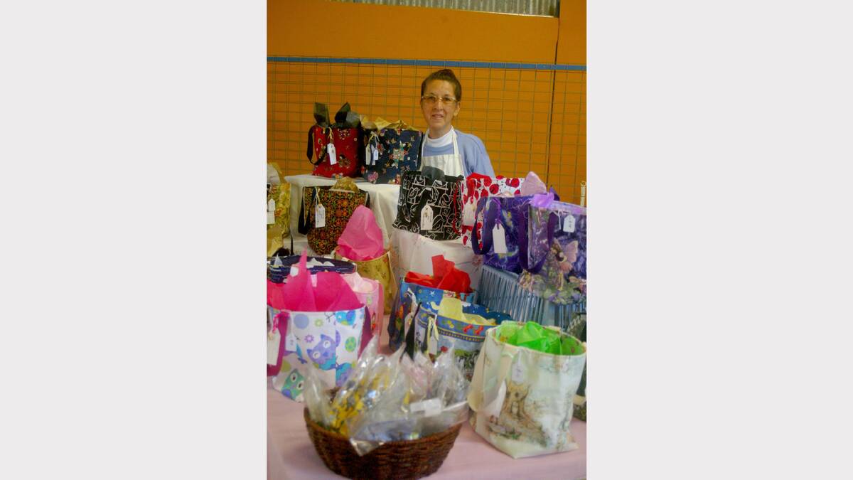 Judy Sheppard with some items up for grabs at this Sunday's Farmers Market and Car Boot Market.