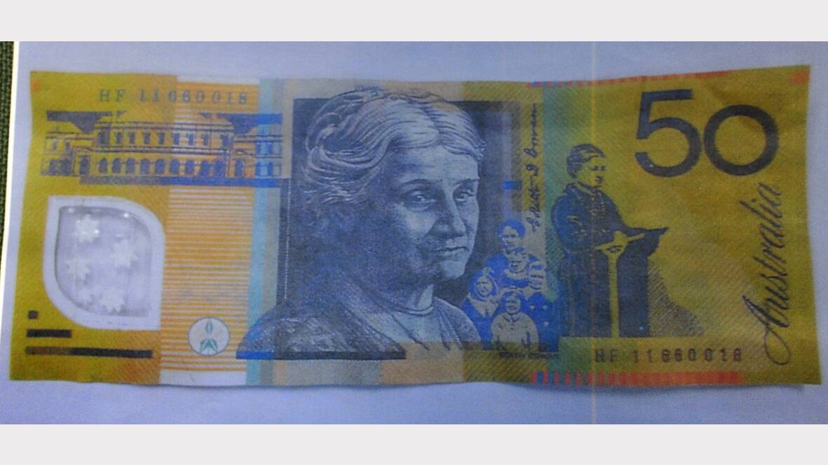 The counterfeit $50 note.