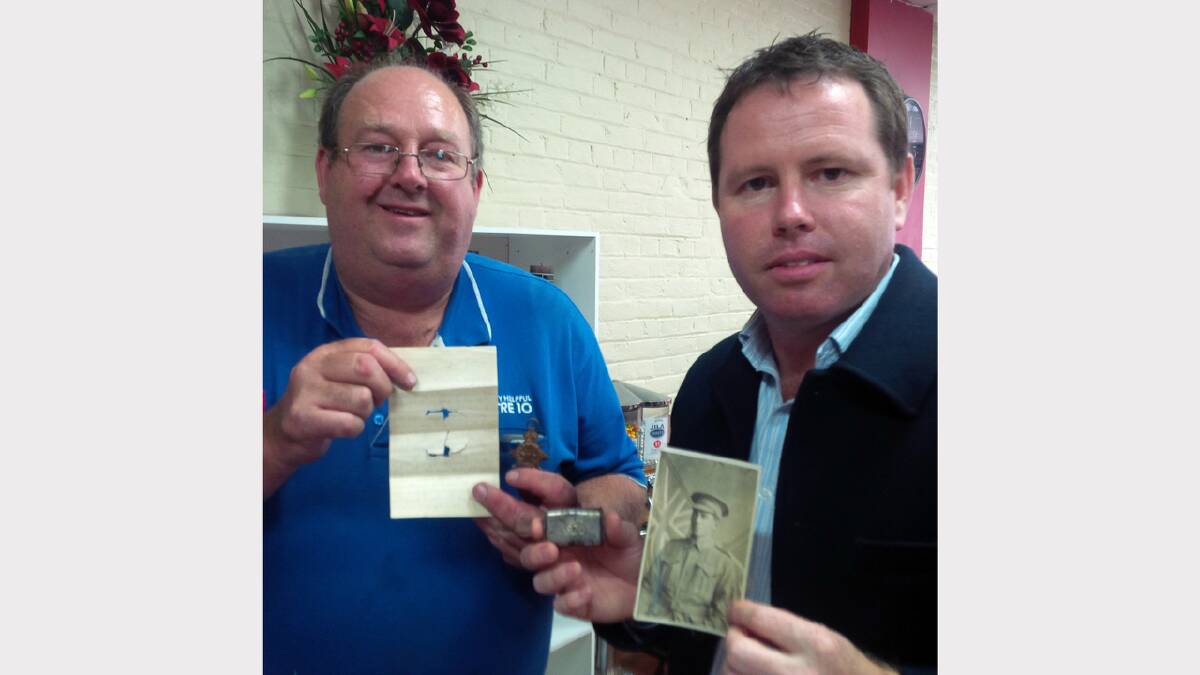 Rodney Matheson and Andrew Broad with memorabilia that belonged to Mr Matheson's great uncle A W A Barber.