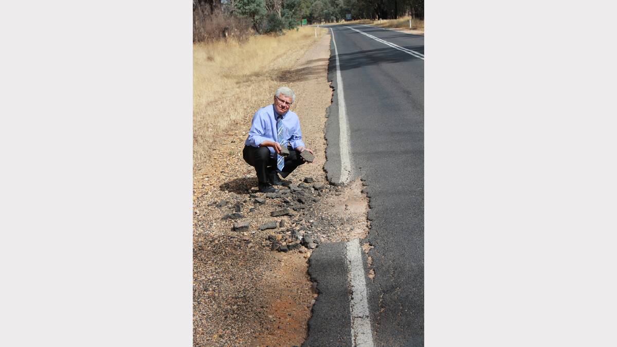 Member for Ripon Joe Helper inspects a road in his electorate that is in disrepair.