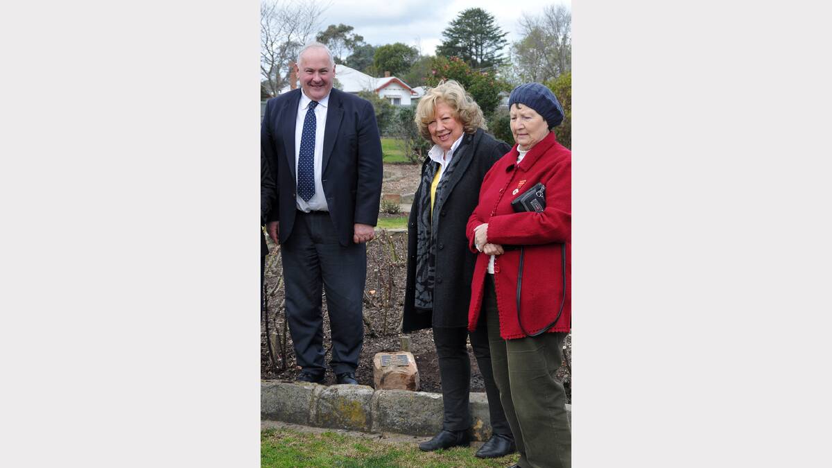 Pictured at the planting are Mayor Cr Kevin Erwin, Red Garters president Geraldine Monaghan and resident Alison Neill.