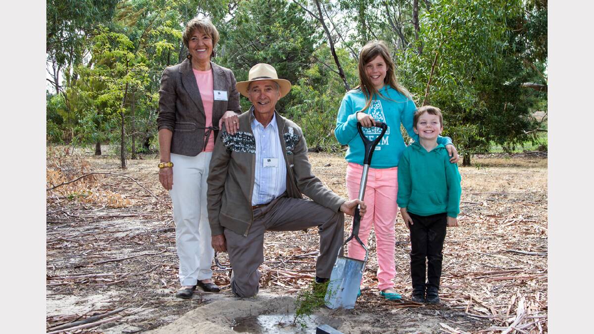 Wildlife Art Museum patron Glenda Lewin and botanist Neil Marriott are pictured with Laura and Blake Hyslop after a tree planting ceremony.