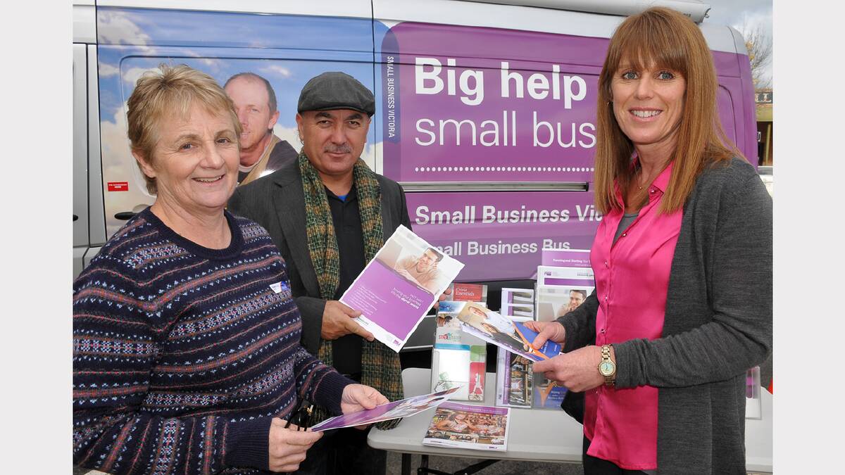 Business Mentoring Service mentor, Sue Olston and Small Business Victoria information officer Sakin Boyaci, provide information to Stawell business owner Cheri Mellor.