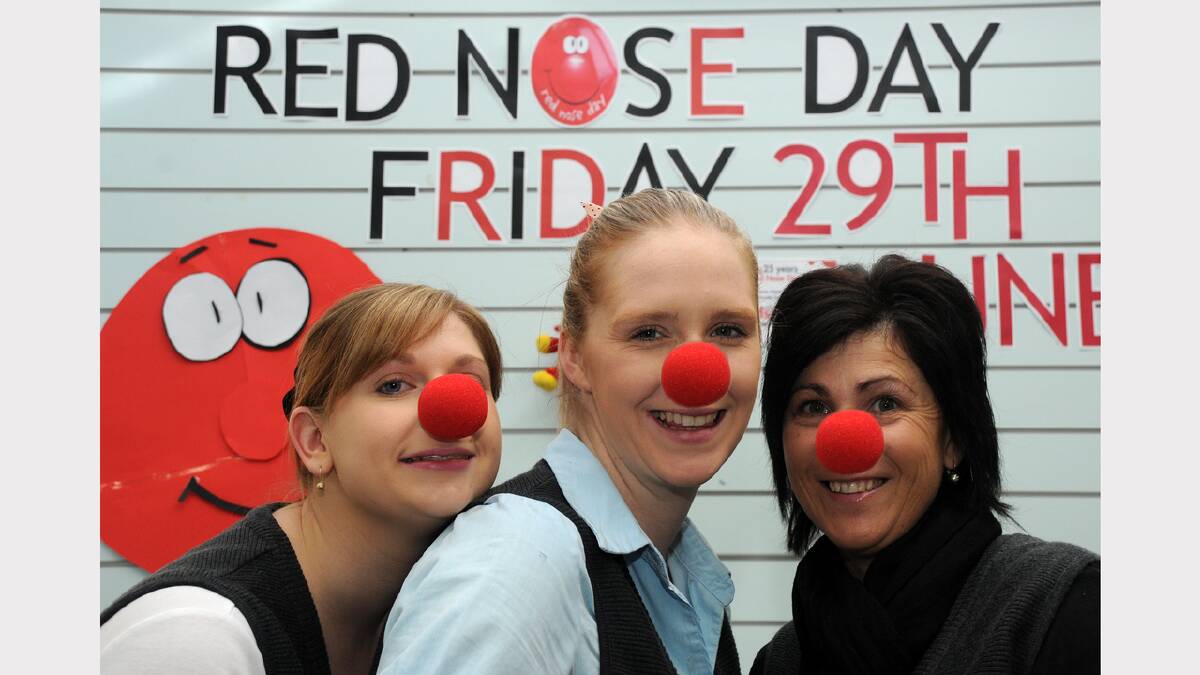 Renae, Skye and Jo wear red noses to promote Red Nose Day.