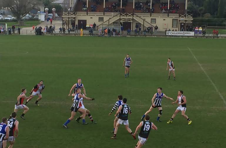 The ruckmen lockup as the ball gets tossed in during the second quarter.