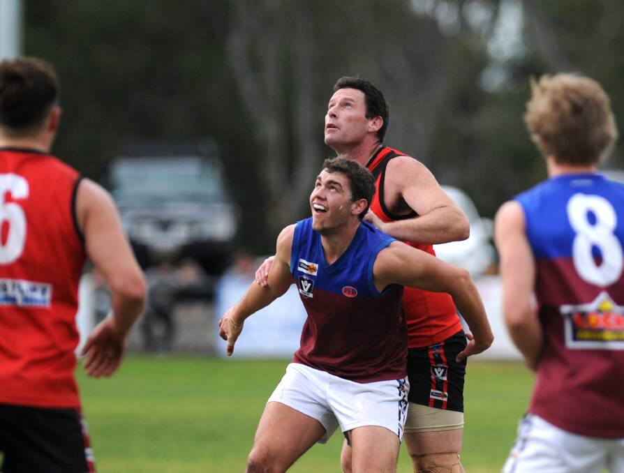 EYES UP: Stawell's Shane Field contests a boundary throw in against Horsham's Billy Carberry in the first semi-final. Field will be an important factor for his side in the preliminary final against Minyip-Murtoa. Picture:SAMANTHA CAMARRI