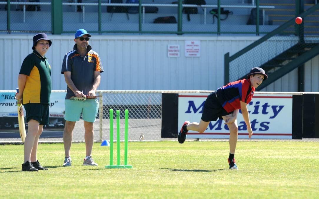 DELIVER: Ryan Holborn sends the ball down for Horsham Primary School during the Twenty20 primary school blast at Horsham City Oval on Tuesday. Picture: SUART McGUCKIN