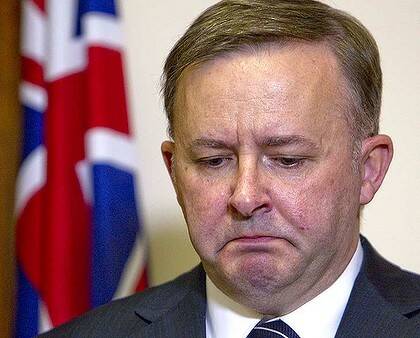 Uneasy: an emotional Anthony Albanese emerges today to side with Kevin Rudd: