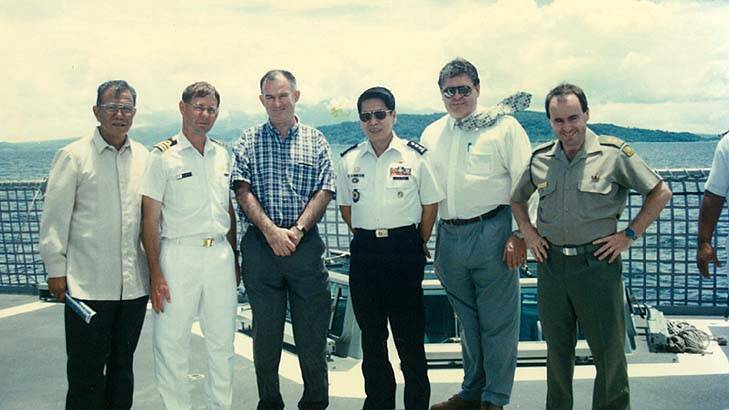 The main players ... Cyril Peel (second from right) with Philippines military personnel in 1997.