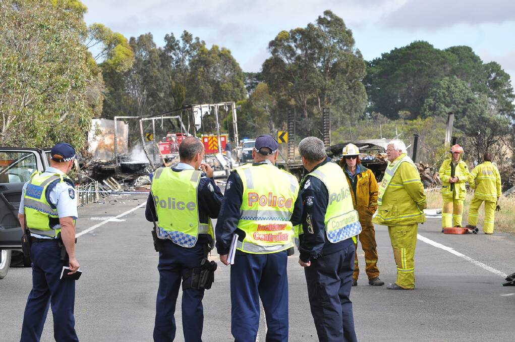 Road blocks remain in place as police investigate the circumstances of the horror crash.