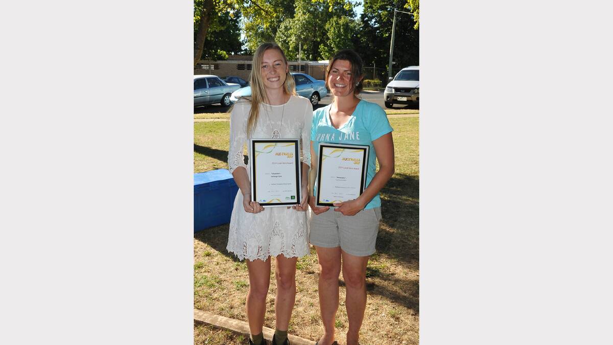 Ashleigh Dark and Lynley Hoiles accept their Australia Day Local Hero Awards. Picture: MARK McMILLAN.
