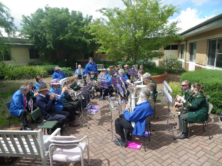 Stawell City Brass Band traveled to the Horsham Hospital to play outside a window where the conductor of the Horsham Band, Harry John lay in his bed.