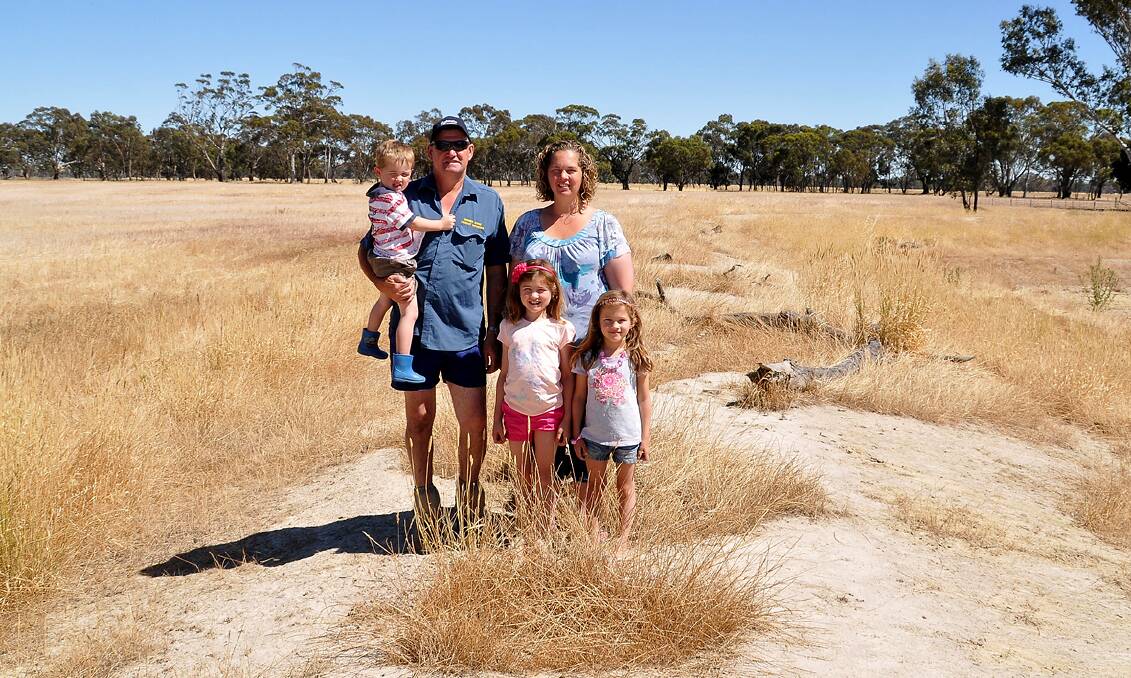 The Stewarts (L-R) Brett, Angus, Georgie, Reanna and Babette may finally see some money flow their way two years after floods ravaged the Greens Creek area. Picture: MARK McMILLAN