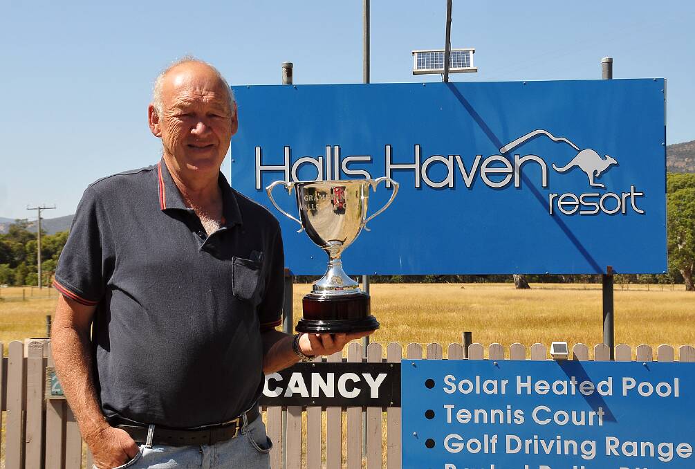 Halls Haven Resort owner Geoff Watts with the Grampians Halls Gap Cup, which will be up for grabs next Tuesday at Ararat's NMIT Park. Picture: KERRI KINGSTON.