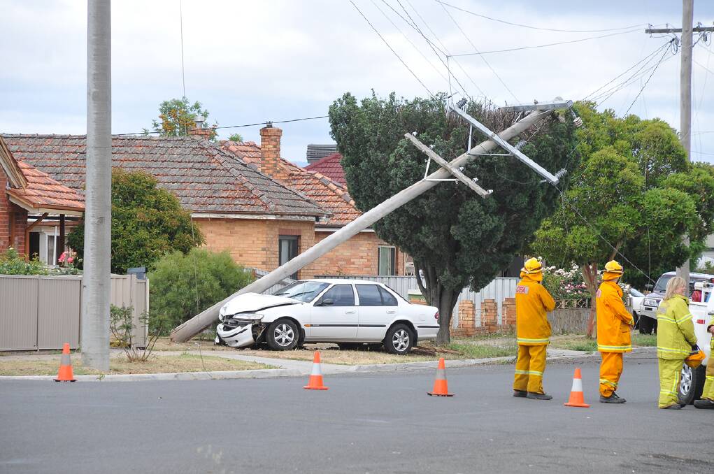 The impact of the vehicle lifted the pole from the ground. Pictures: MARCUS MARROW