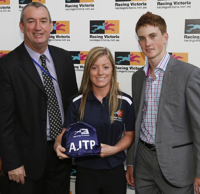 Chelsea Hall is pictured at the ceremony with Racing Victoria's Executive General Manager - Racing, Greg Carpenter and Cox Plate winning apprentice Chad Schofield.
