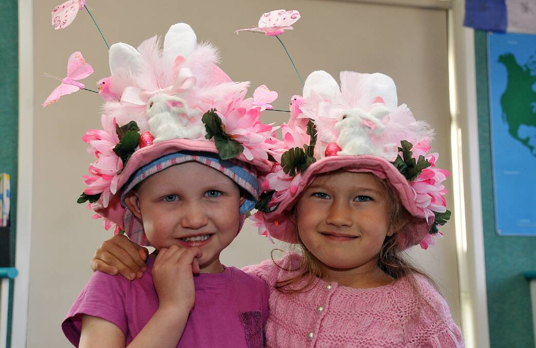 Early Learning Centre held an Easter fundraiser for cancer sufferer Sienna (left). Children dressed in Pink and blue. Sienna is pictured with her friend Reana.