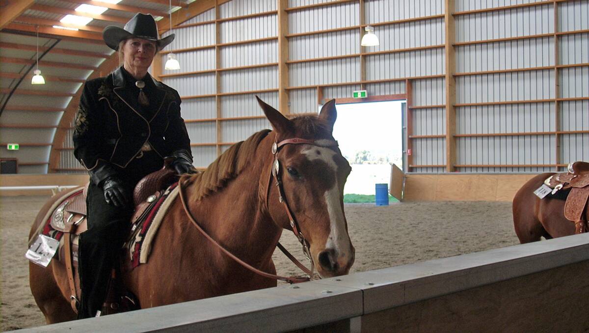 Owner Sharon Delaney aboard successful quarter horse Jack Patch.