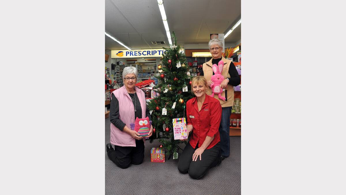 Lois Nuske, Susan Byron and Julie Bowater with the giving tree at Grampians Pharmacy.