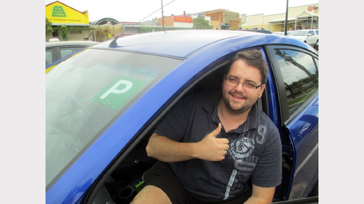 Mitch Campleman gives the thumbs up to the L2P driver mentor program.