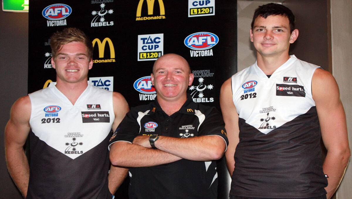Kyle Hendy (far right) is pictured with Rebels 2012 captain David Morris and coach David Loader. Hendy will be attending the AFL state draft combine while Morris is participating in the upcoming DraftStar Combine.  