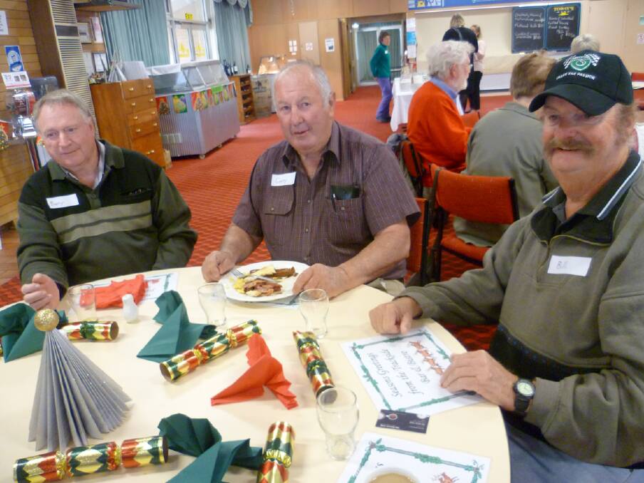 Volunteers Barry, Garry and Bill are pictured at the International Volunteer Day celebrations in Stawell.