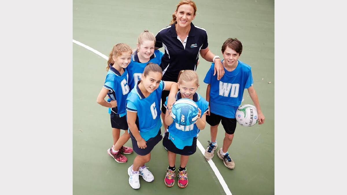 Former Diamonds captain Sharelle McMahon with a group of netball youngsters.