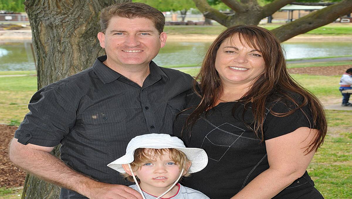 Matthew Phelan with his wife Joanne and son Carlin at his family farewell function at Cato Lake. 