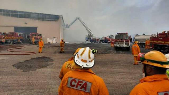 SHED FIRE: CFA crews at the large shed fire at the Gilmac site on Sunday. Picture: CONTRIBUTED.
