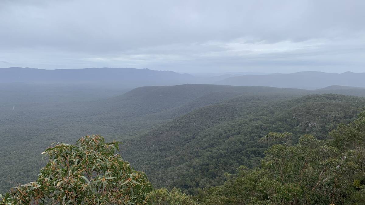 CLOUDS: The rain clouds over the Grampians at Reed Lookout on Saturday afternoon. Picture: ALISON FOLETTA
