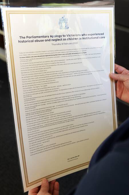 Survicors recieved copies of the apology signed by the premier. Picture by Kate Healy