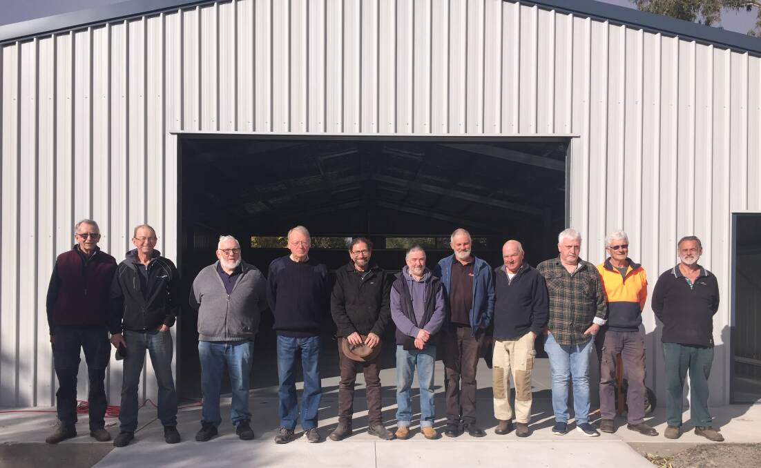 MOVING IN: Pomonal Men's Shed members Trevor Newell, Rob Porter, Chris Huggins, Barry Colyer, Russ Kellett, Paul Granger, Stuart Thorpe, Wayne Farey, Ian Ivey, Phill Bennett, and Paul Shelley at the entrance of their new shed. Picture: KLAUS NANNESTAD 