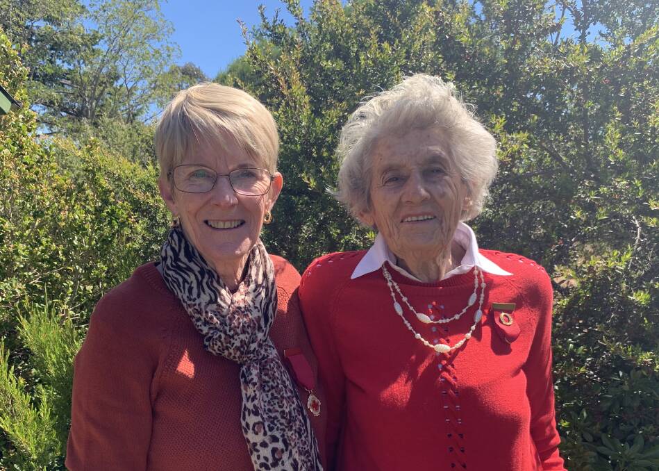 LIVING LEGEND: Stawell Red Garter volunteers Kerry Hapgood (left) and Elva Raggatt received badges of honour after decades of service. Picture: TALLIS MILES 