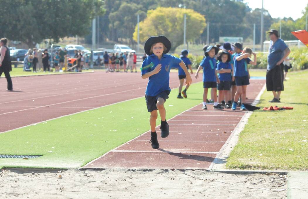 SPEED: Halls Gap pupil Jim Hewitt approaches the pit for his long jump effort. Picture: TALLIS MILES