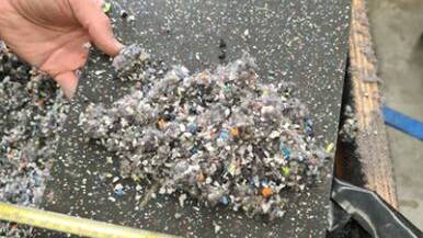 CRUMBS: The Australian Sporting Goods Association are hoping to collect old runners to recycle them into crumbs for building new floors. Picture: CONTRIBUTED