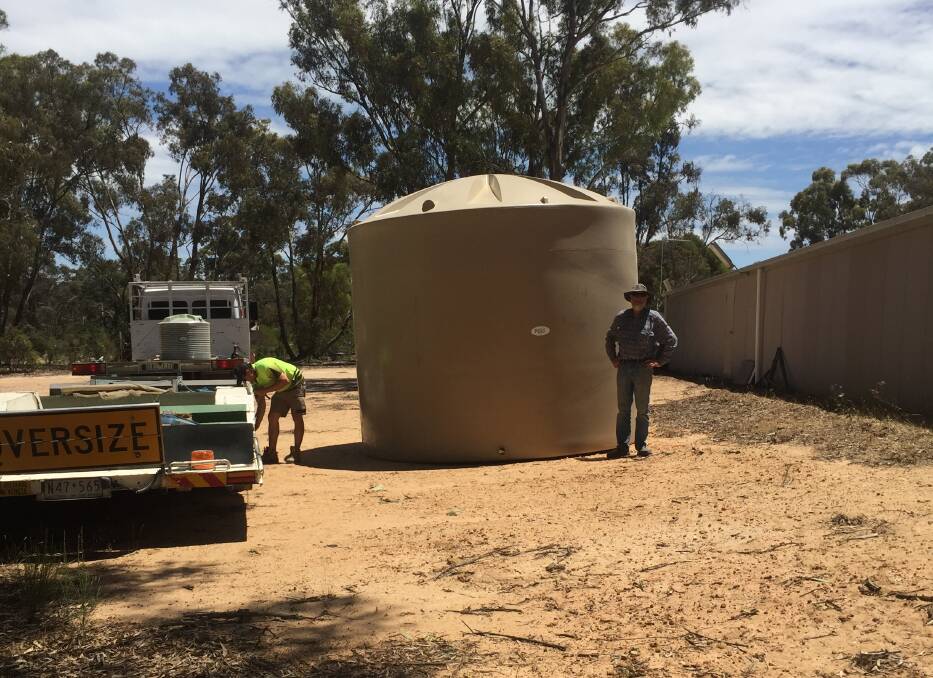 BIG SUPPLY: Stawell Rifle Club has got a new water tank thanks to the Ararat Wind Farm Sustainable Community Grants Program. Picture: CONTRIBUTED