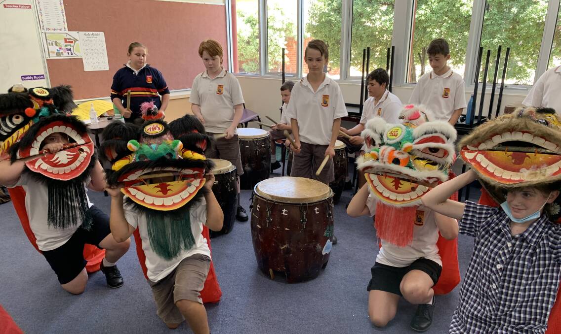 NEW YEAR: Stawell Secondary College Year 7C students learning a lion dance and using Chinese percussion instruments. Picture: TALLIS MILES