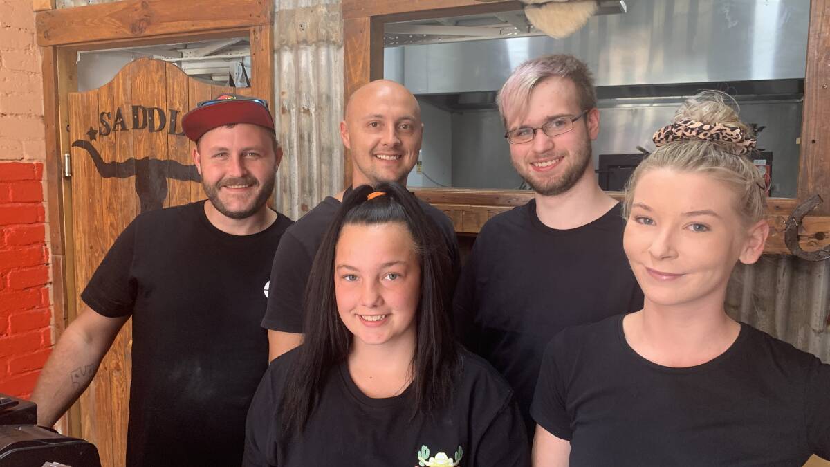 OPEN: Burger Ranch owner Cecil Grobelaar (centre) with his staff Michael McKenny (left), Ebony Parrott, William Delley and Brittani Edgar. Picture: TALLIS MILES