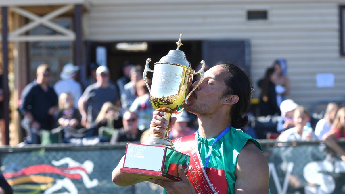 VICTORY: Edward Ware has competed a rare double of the Stawell Gift and the 200 metres handicap wins. Picture: TALLIS MILES