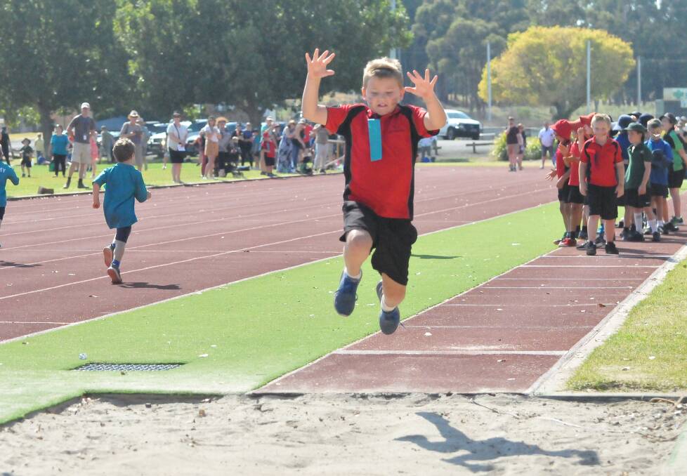 HANG TIME: Moyston pupil Billy Dalton getting some air with his long jump effort. Picture: TALLIS MILES