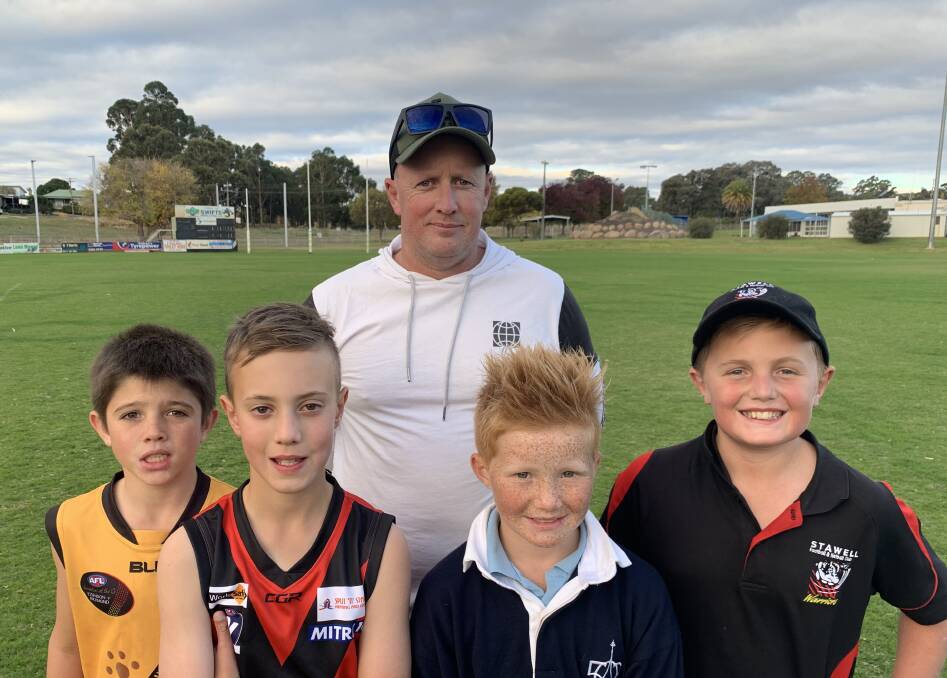 EXCITED: Jackson Notting, Charlie Dunn, Andrew Dunn, Archie Hoffmann and Tom Collins can't wait for the Stawell under-13 football competition to get underway. Picture: TALLIS MILES