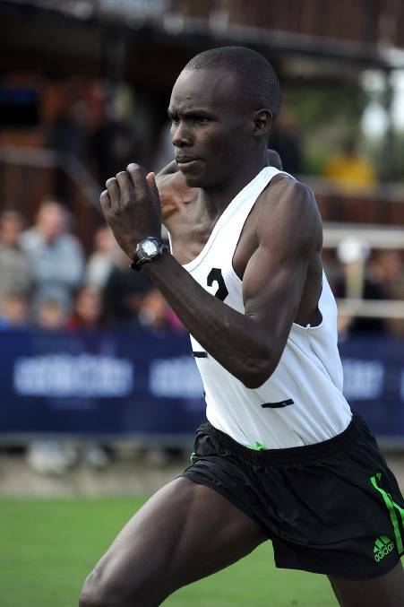 WINNER: Kenyan runner Collins Kiprotich Cheboi in the Backmarkers handicap at the 2011 Stawell Gift. Picture: FAIRFAX PHOTOGRAPHERS