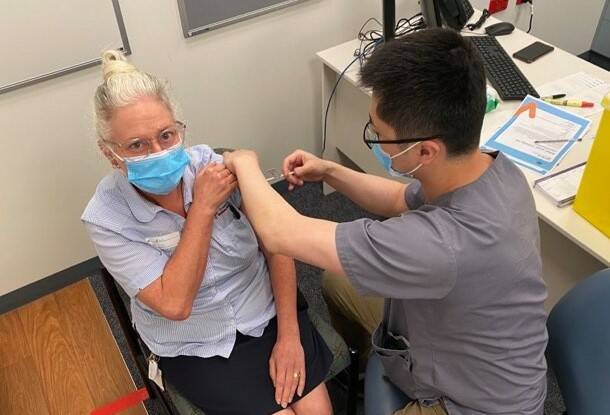 JABS: Staff member Amanda Baker received her vaccination from Dr Xiao from the Stawell Medical Centre at the vaccination clinic in Building B at the Stawell hospital. Picture: CONTRIBUTED