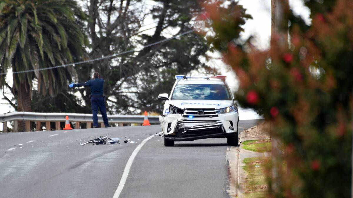 CRASH: A police car was damaged in the incident. Picture: KARL MEYER