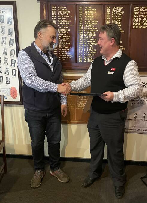 AWARD: Stawell Athletic Club president Geoff McDermott presents Scotney Hayter with his life membership of the club. Picture: CONTRIBUTED